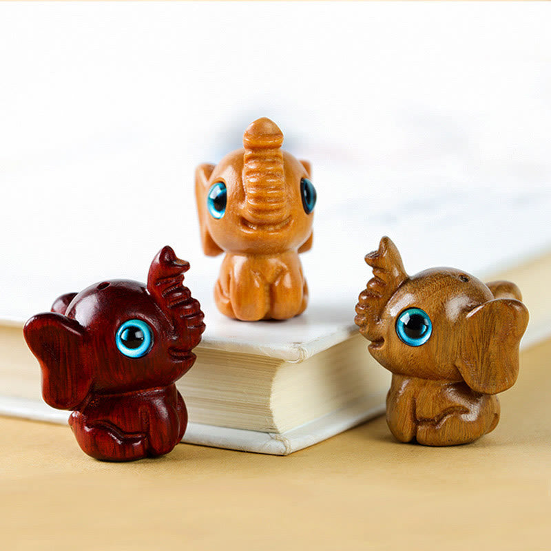 Mini éléphant sculpté en bois de santal pour la protection et la chance