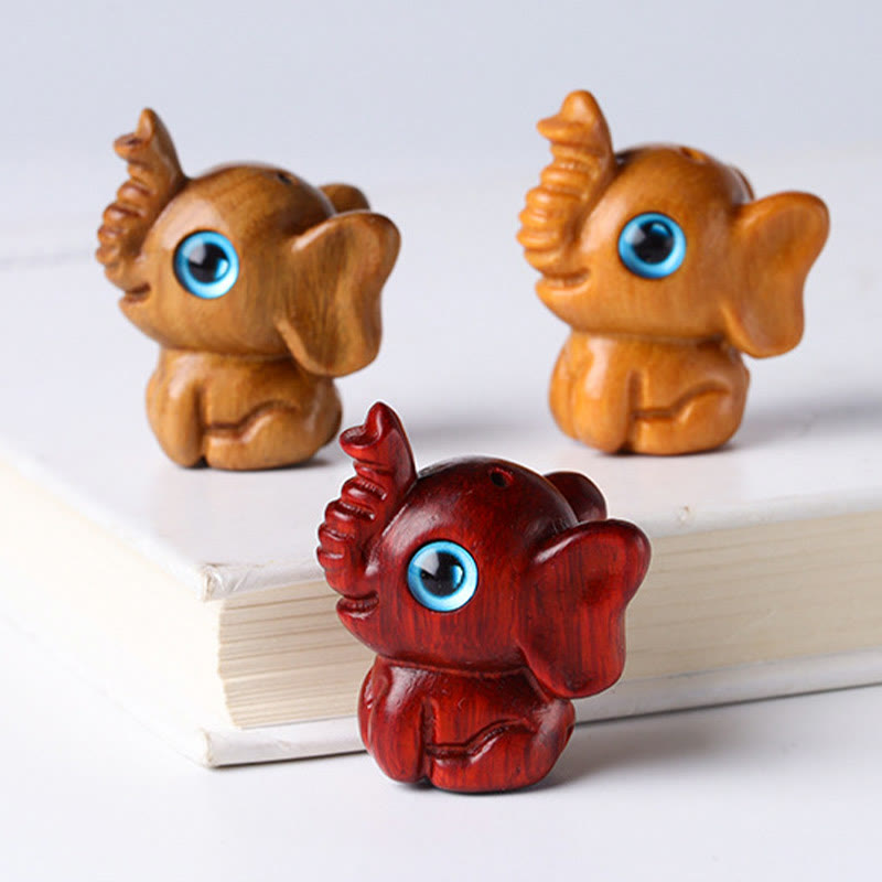 Mini éléphant sculpté en bois de santal pour la protection et la chance