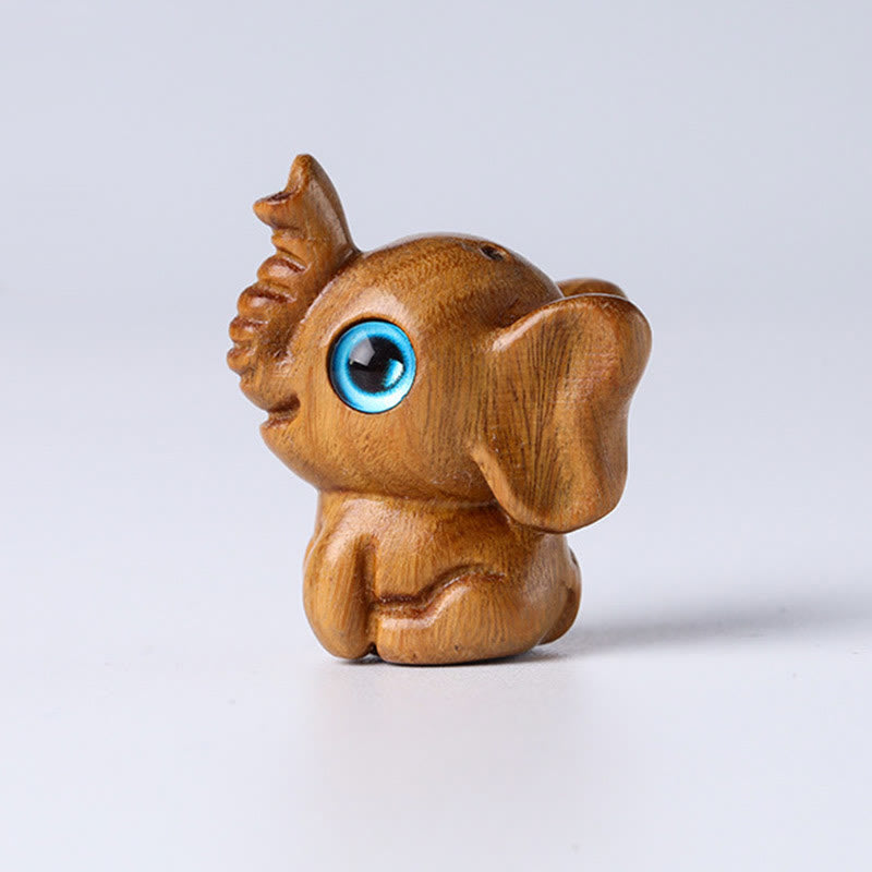 Mini éléphant sculpté en bois de santal pour la protection et la chance