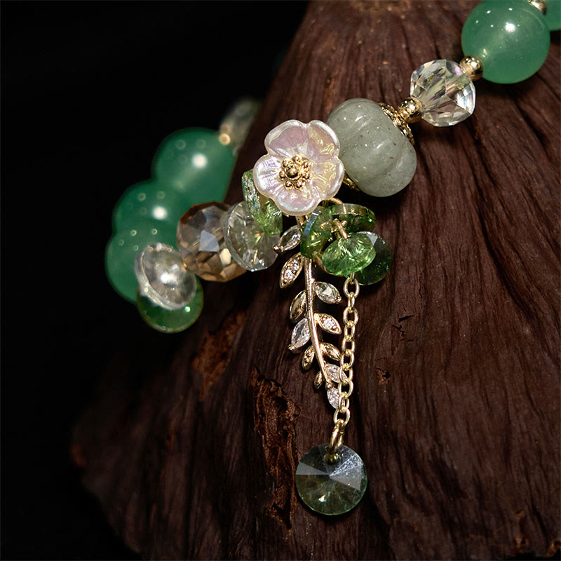 Bracelet de guérison multi-pierres avec accents floraux