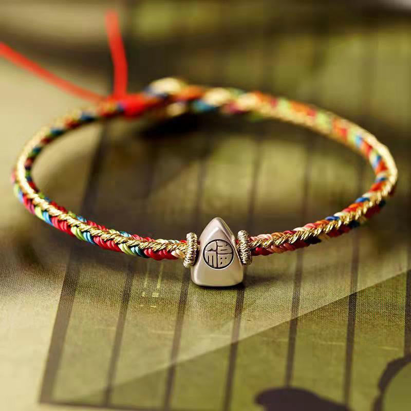 Bracelet tressé en fil rouge multicolore avec personnage Fu en argent 925