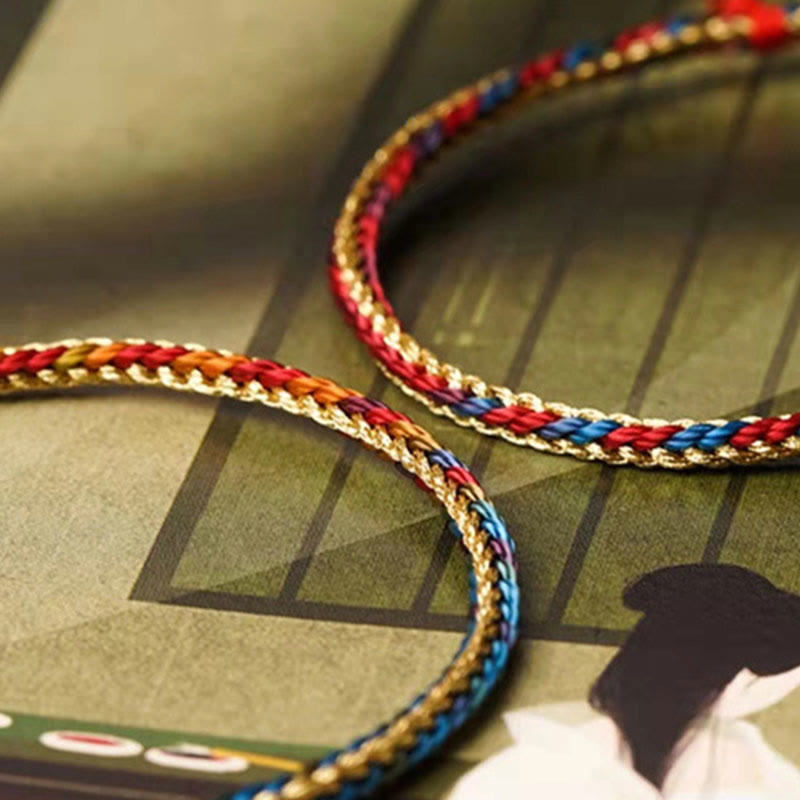 Bracelet tressé en fil rouge multicolore avec personnage Fu en argent 925