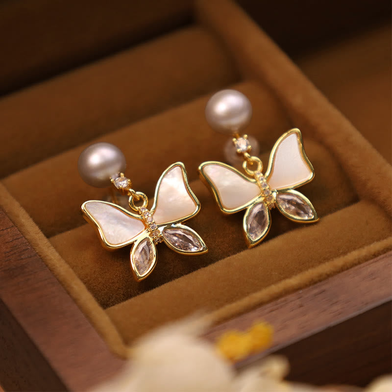Boucles d'oreilles à tige en nacre d'ormeau naturelle avec motif papillon