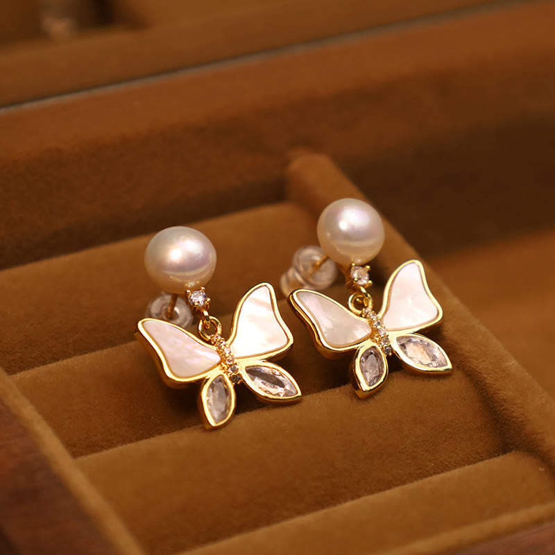 Boucles d'oreilles à tige en nacre d'ormeau naturelle avec motif papillon