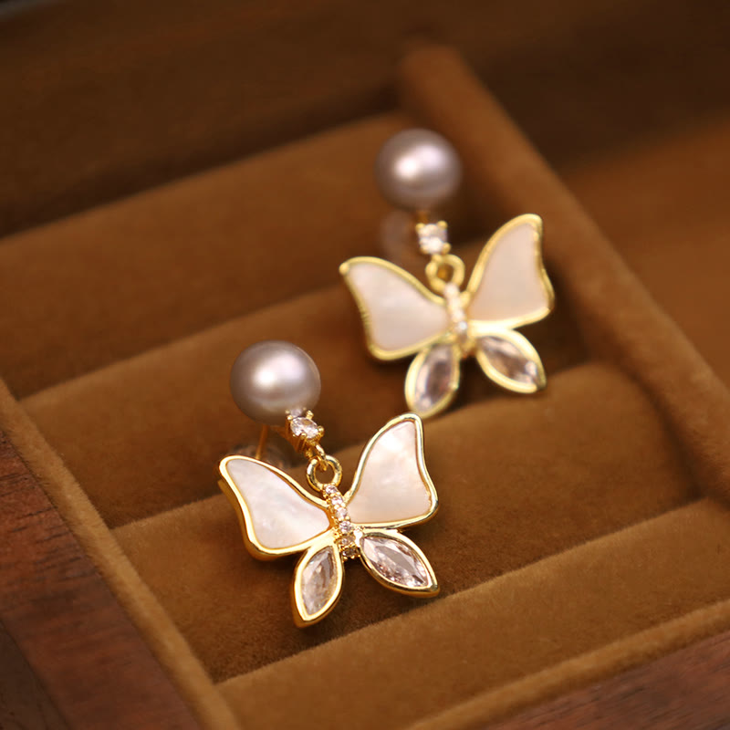 Boucles d'oreilles à tige en nacre d'ormeau naturelle avec motif papillon