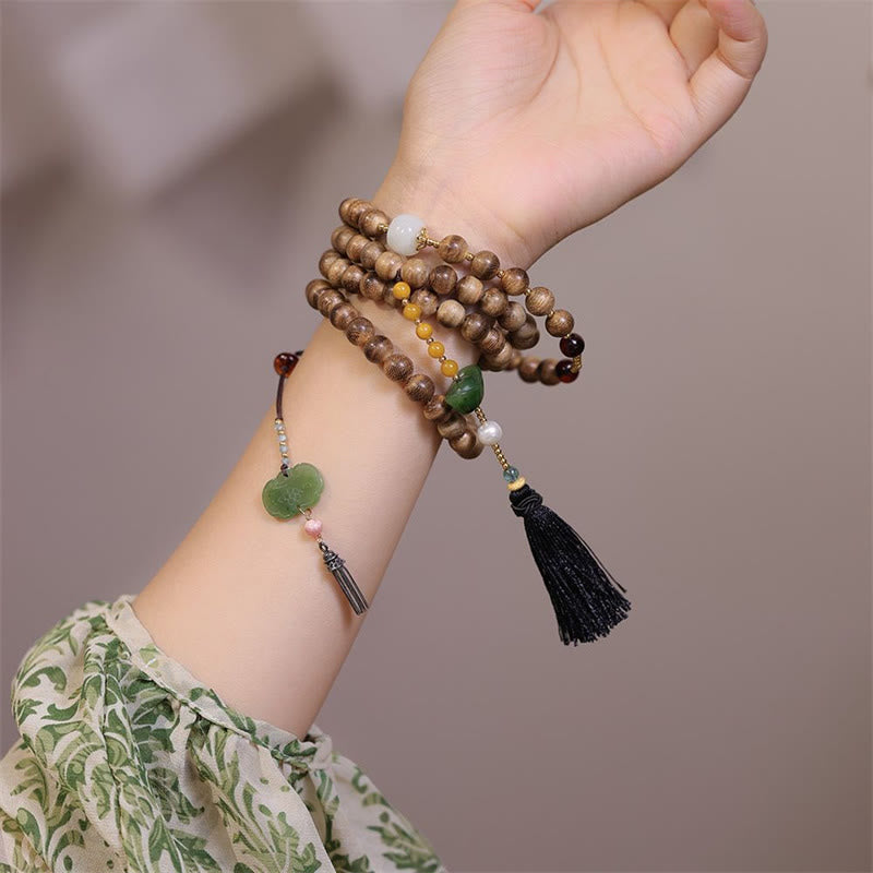 Bracelet en bois d'agar et jade ambré naturel pour l'équilibre et la protection