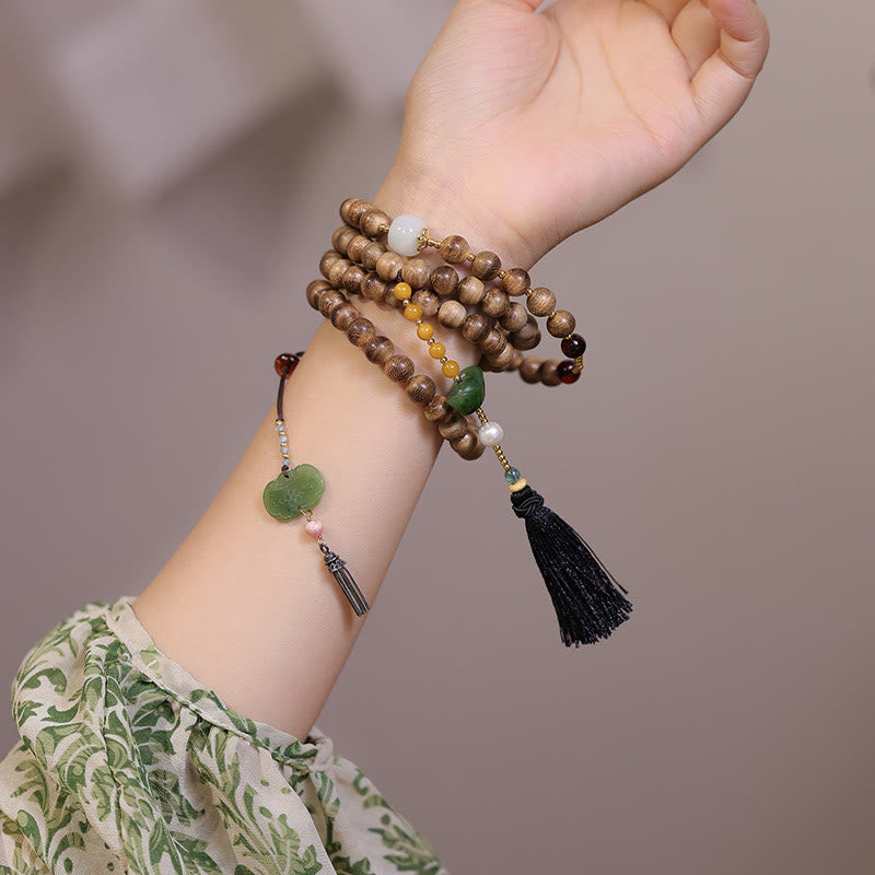 Bracelet en bois d'agar et jade ambré naturel pour l'équilibre et la protection