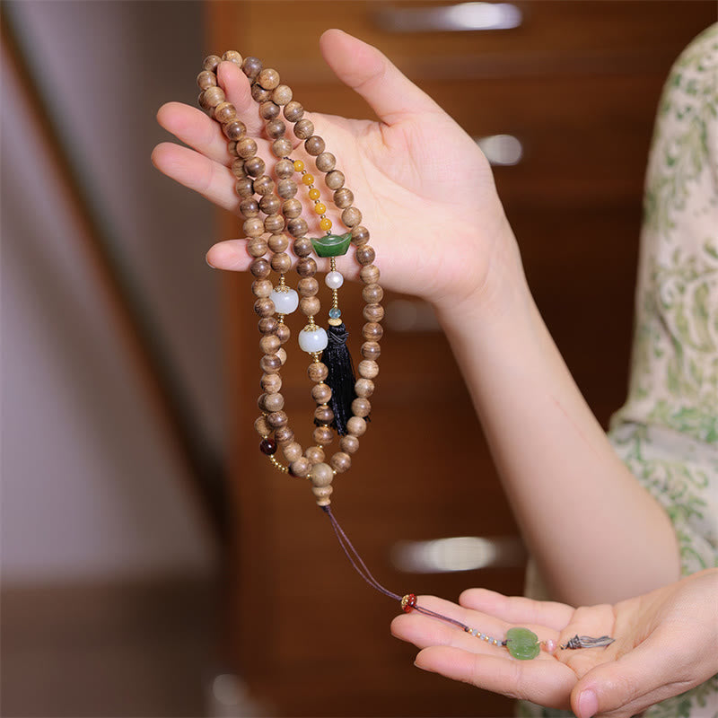 Bracelet en bois d'agar et jade ambré naturel pour l'équilibre et la protection