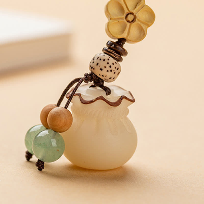 Porte-clés porte-monnaie en graines de Bodhi naturelles pour la prospérité