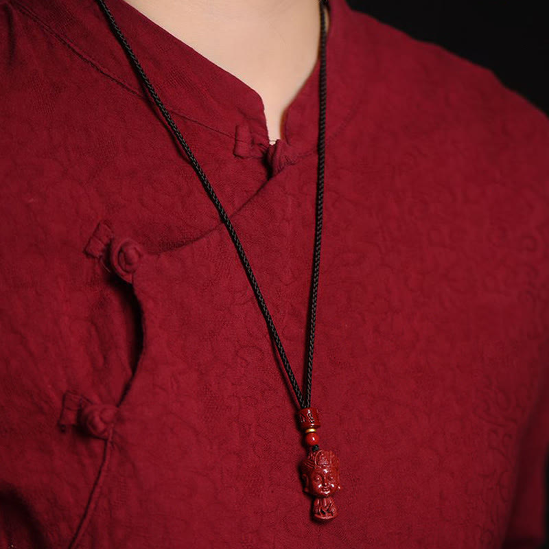 Collier du zodiaque chinois en cinabre naturel avec protection du Bouddha natal