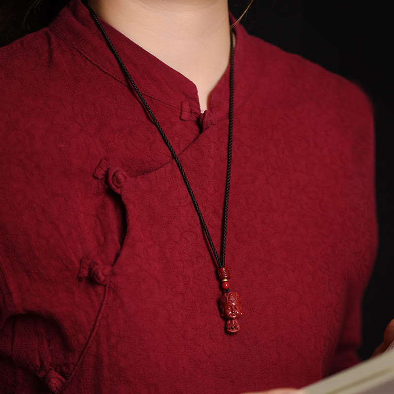 Collier du zodiaque chinois en cinabre naturel avec protection du Bouddha natal
