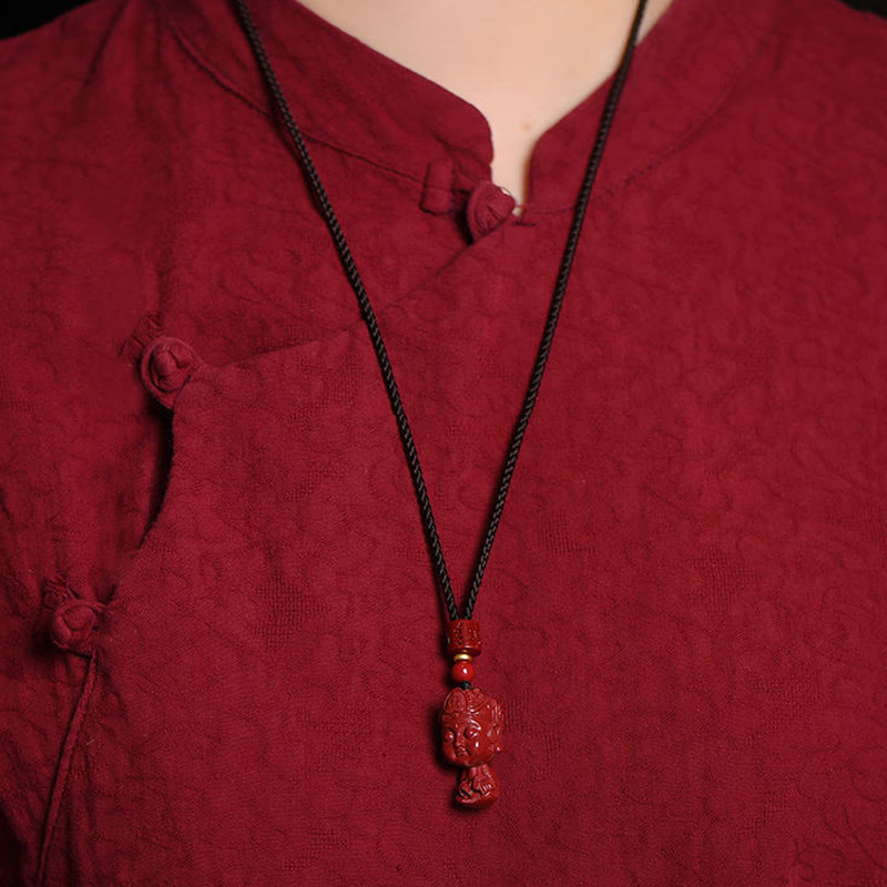 Collier du zodiaque chinois en cinabre naturel avec protection du Bouddha natal