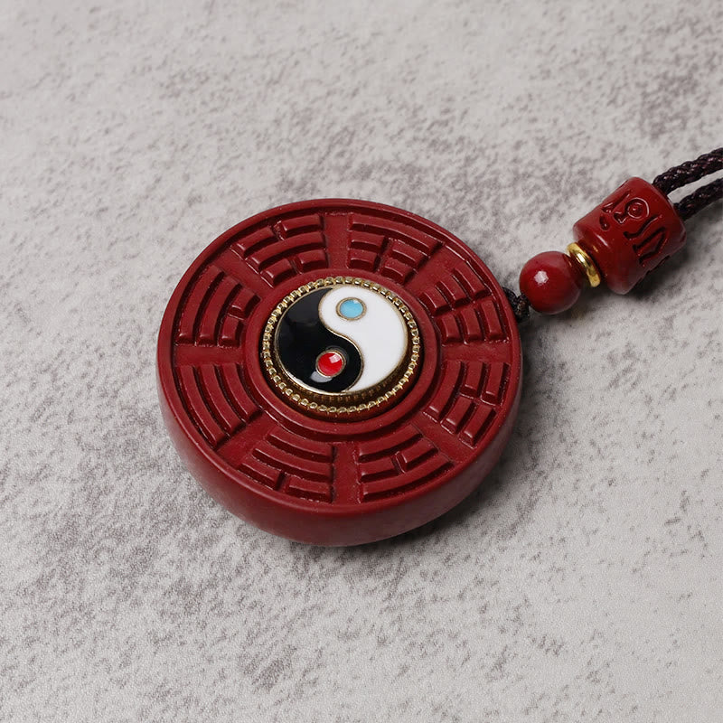 Pendentif Yin Yang en cinabre naturel pour la protection et l'équilibre