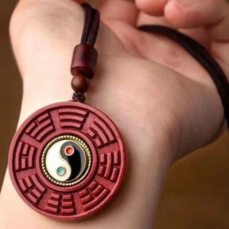 Pendentif Yin Yang en cinabre naturel pour la protection et l'équilibre