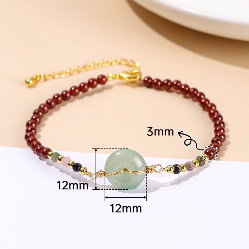 Bracelet calme en perles de grenat naturel avec boucle de paix
