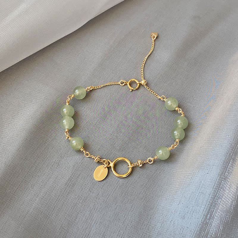 Bracelet en jade Hetian naturel en or 14 carats pour la chance et la prospérité