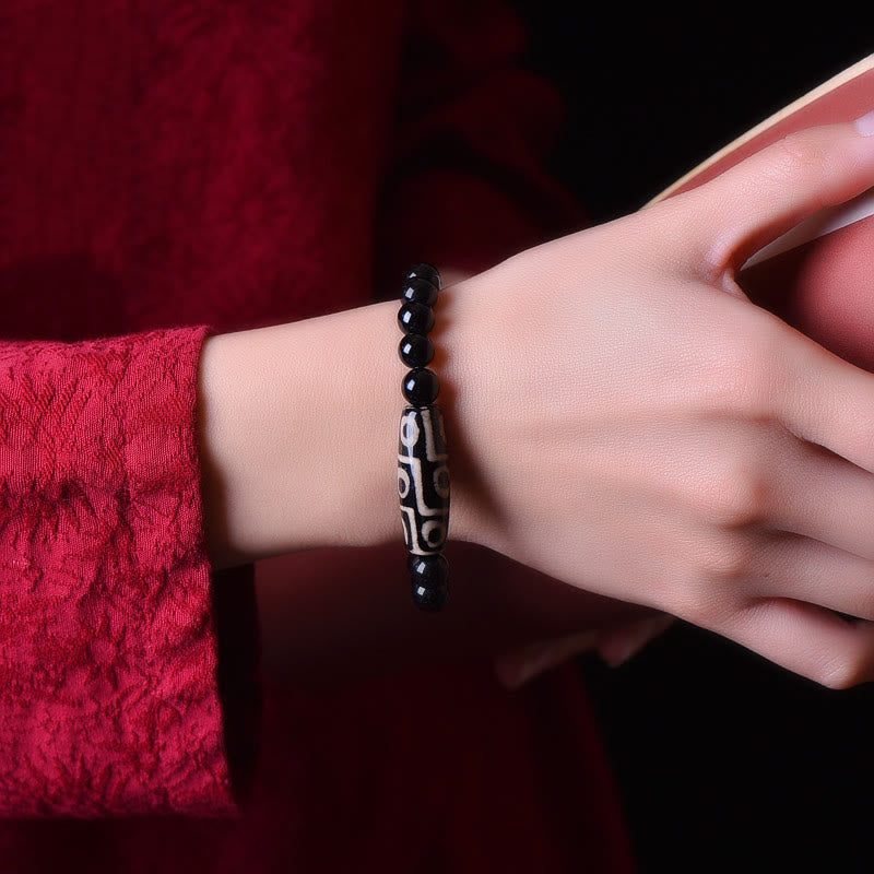 Bracelet de richesse spirituelle en perles dzi naturelles à neuf yeux