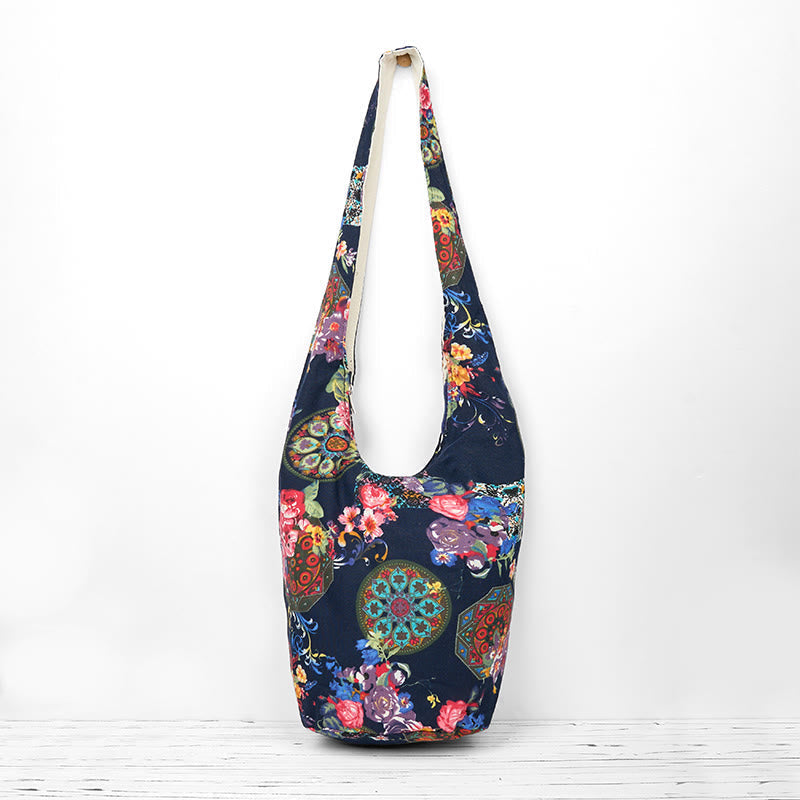 Sac bandoulière en coton bleu marine à motif floral