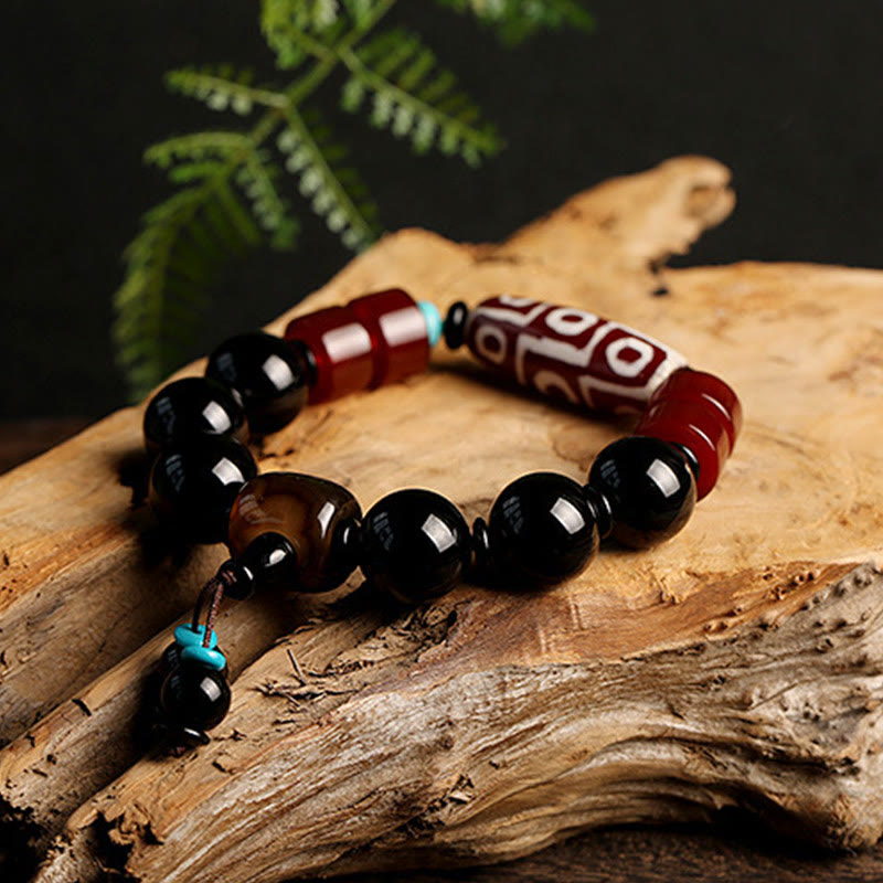 Bracelet de protection en perles dzi à neuf yeux et obsidienne onyx noire