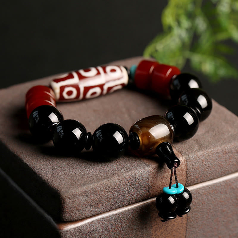 Bracelet de protection en perles dzi à neuf yeux et obsidienne onyx noire