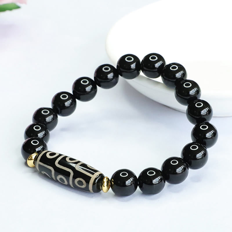 Bracelet de protection en obsidienne et onyx noir à neuf yeux