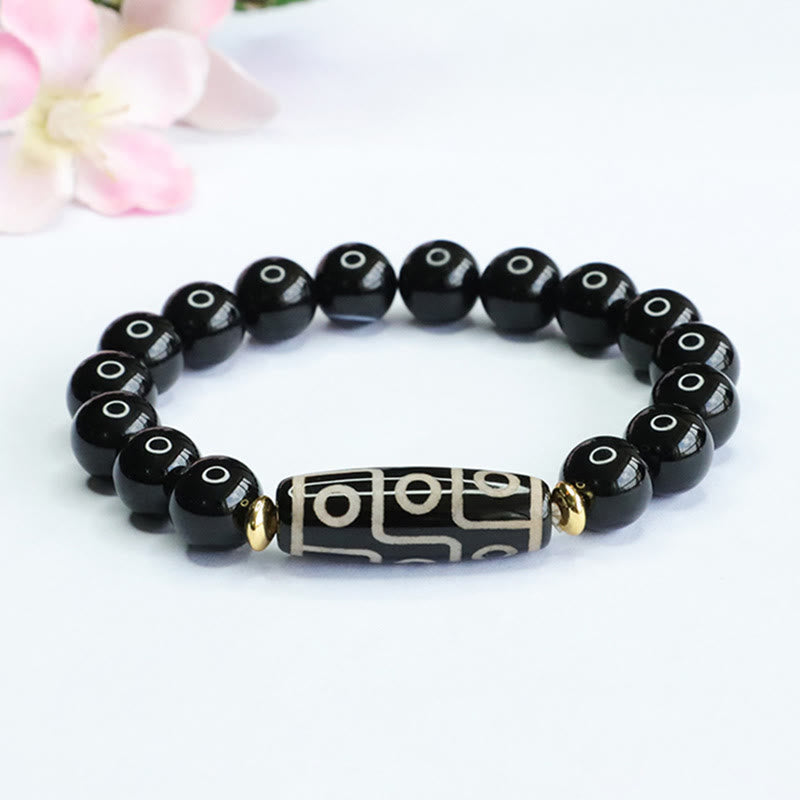 Bracelet de protection en obsidienne et onyx noir à neuf yeux