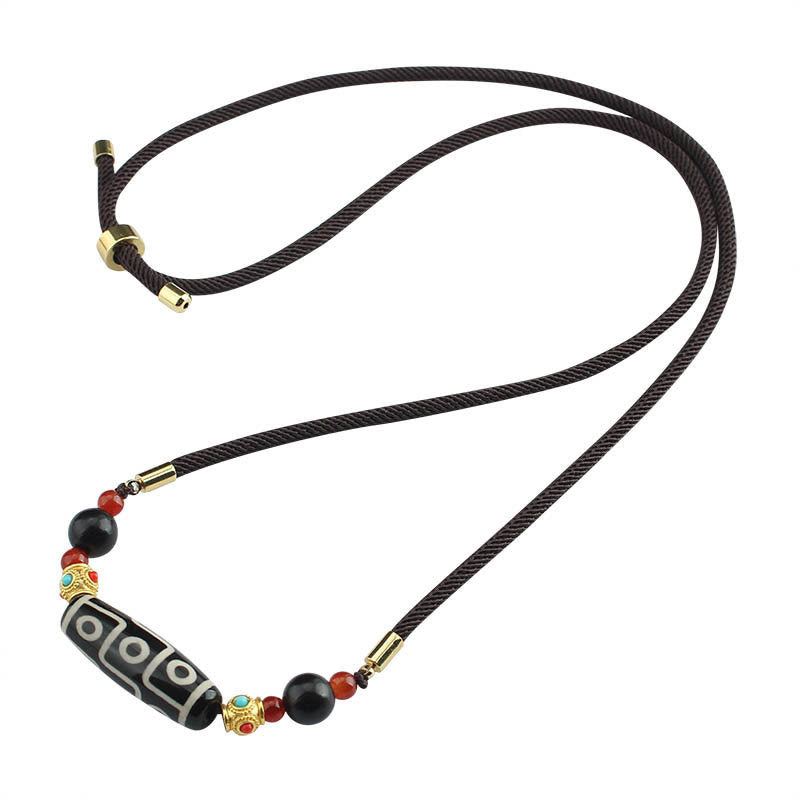 Collier de protection en perles dzi à neuf yeux | Pendentif en agate tibétaine