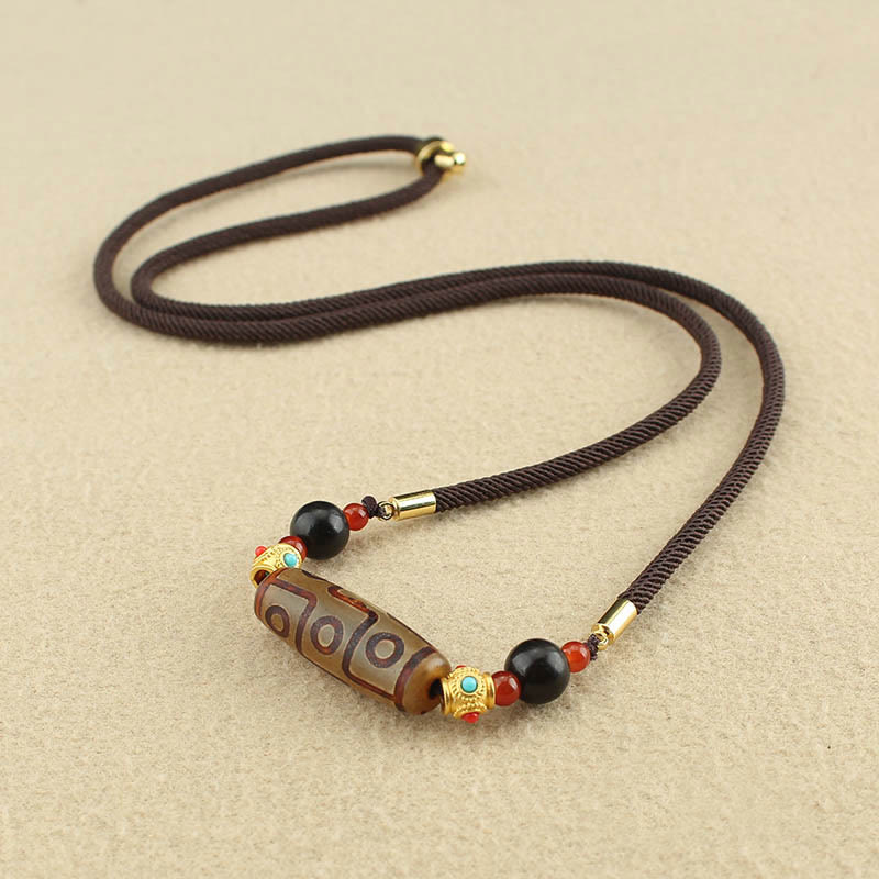 Collier de protection en perles dzi à neuf yeux | Pendentif en agate tibétaine