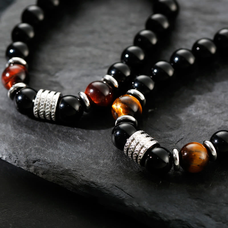Bracelet en obsidienne 10 mm avec œil de tigre pour la force et l'équilibre
