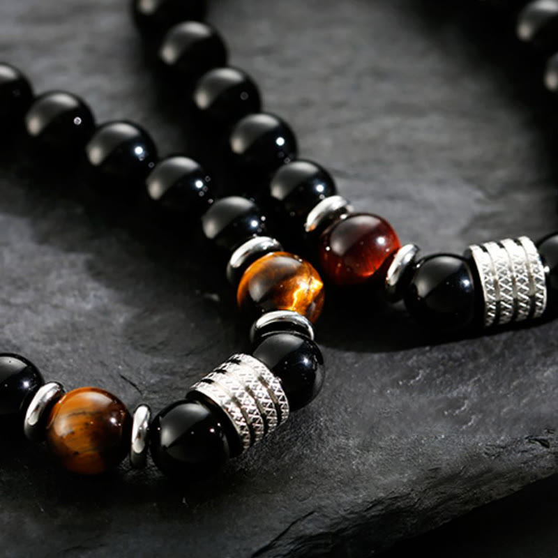 Bracelet en obsidienne 10 mm avec œil de tigre pour la force et l'équilibre