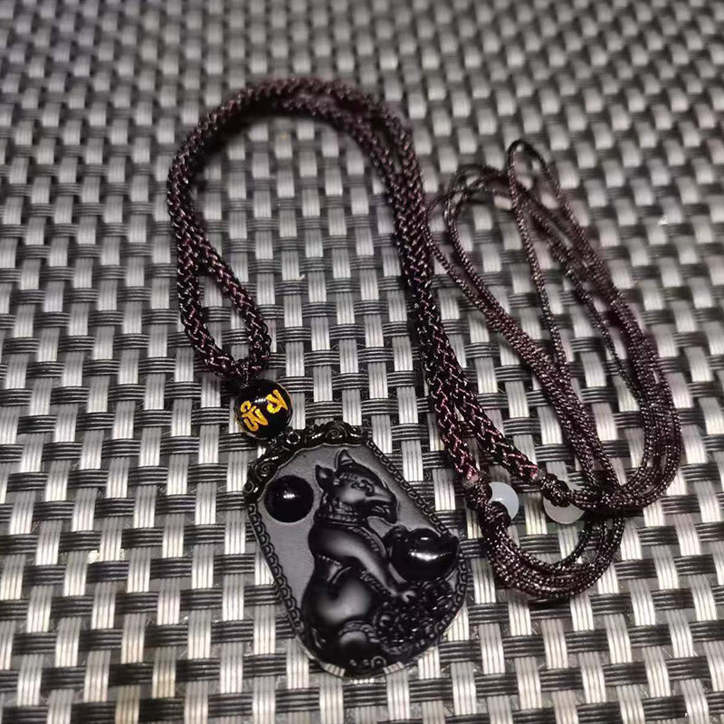 Collier en obsidienne avec symbole du zodiaque chinois et accomplissement de la purification