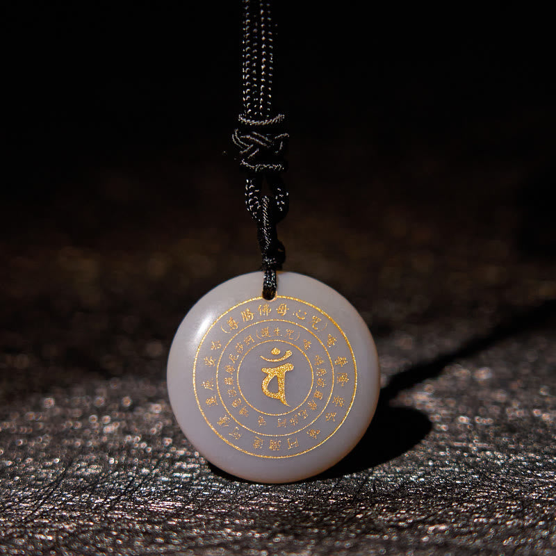 Collier en obsidienne avec pendentif mantra sanskrit pour la force et l'équilibre