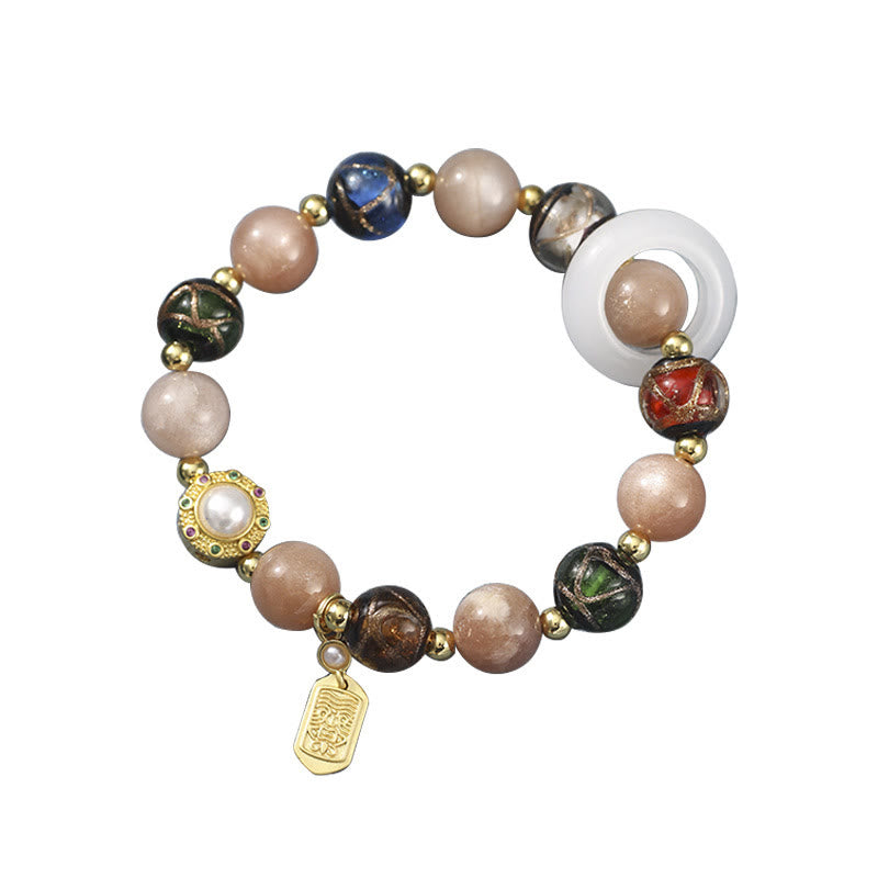 Bracelet Om Mani Padme Hum Om avec Tridacna et pierres de soleil 14-16 cm