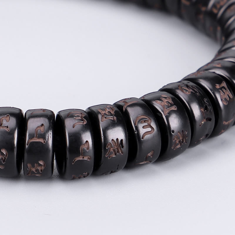 Bracelet positif en coquille de noix de coco Om Mani Padme Hum