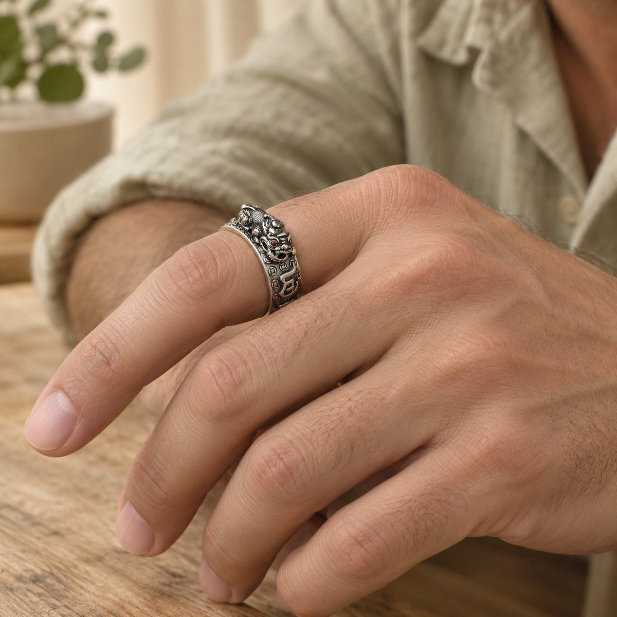 Om Mani Padme Hum Silver PiXiu Wealth Ring 990 Sterling, worn on the finger by a man