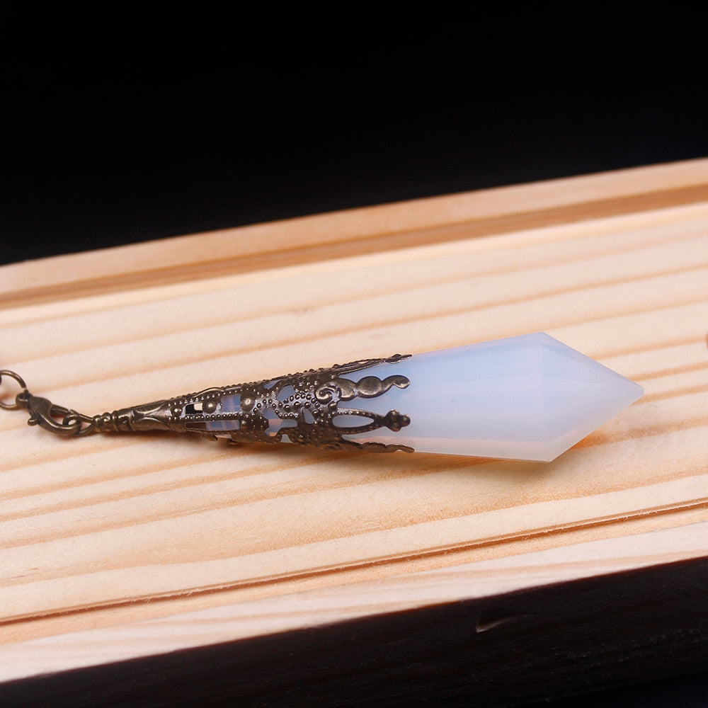 Pendule en cristal d'opale pour un changement positif