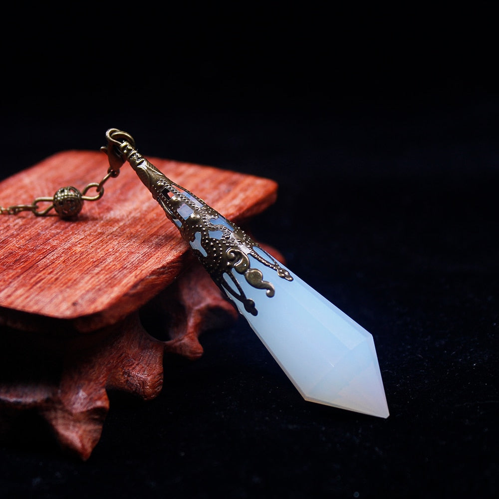 Pendule en cristal d'opale pour un changement positif