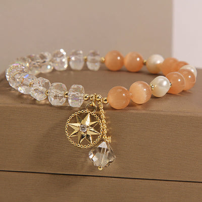 Bracelet de méditation en quartz clair œil de chat orange
