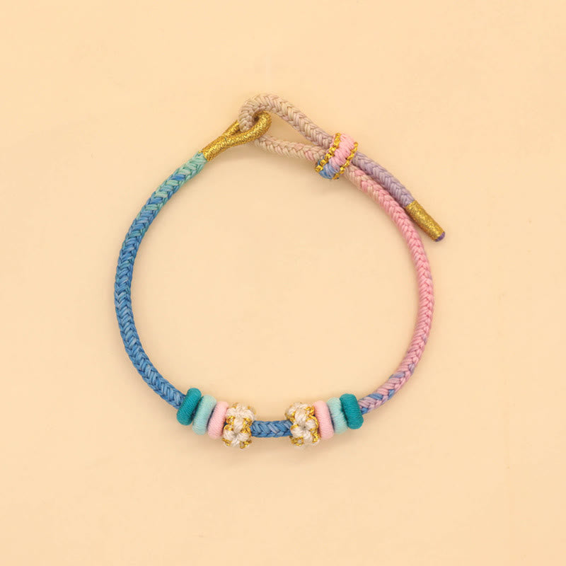 Bracelet à huit fils rouges Peace Knot pour la chance et l'harmonie