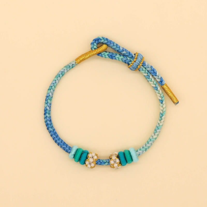Bracelet à huit fils rouges Peace Knot pour la chance et l'harmonie