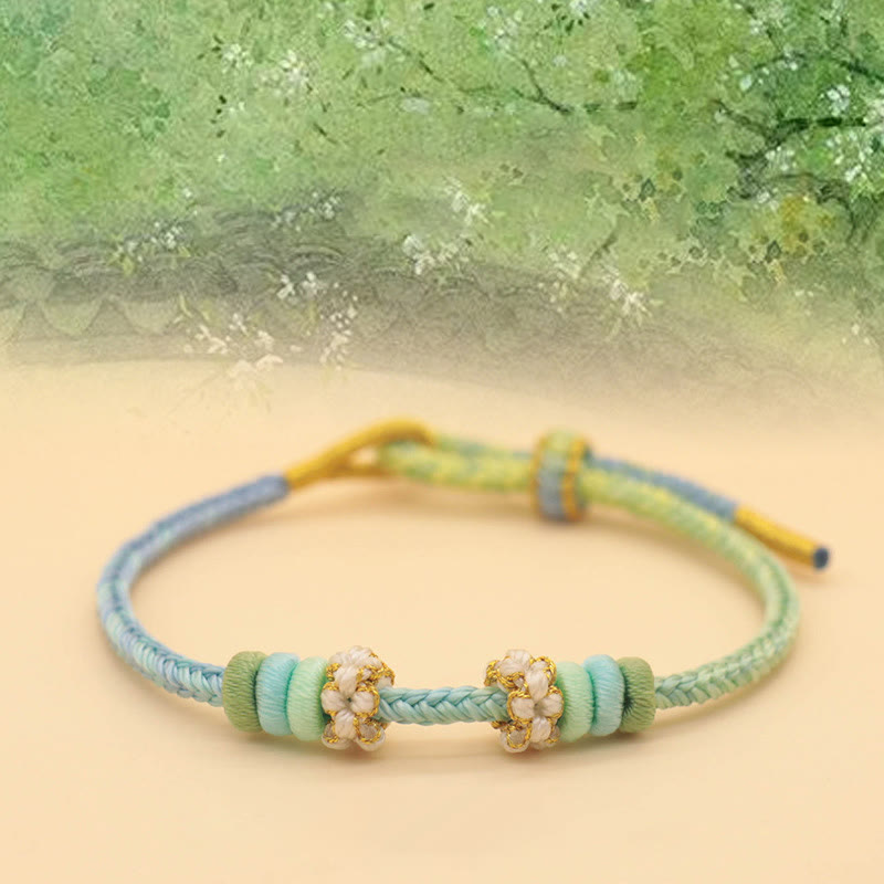 Bracelet à huit fils rouges Peace Knot pour la chance et l'harmonie