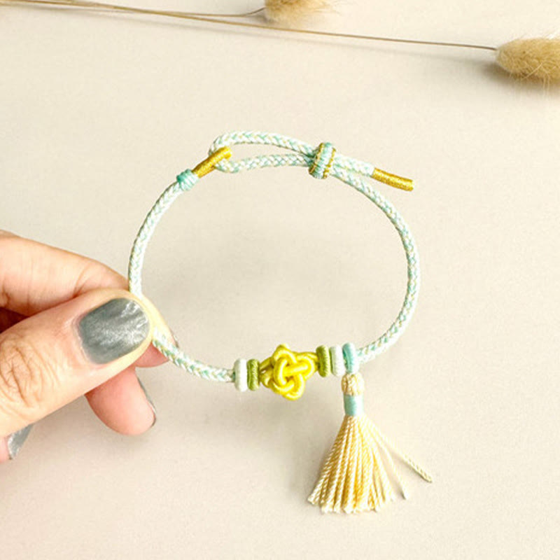 Bracelet de protection coloré en fil de fleur de pêcher pour l'harmonie