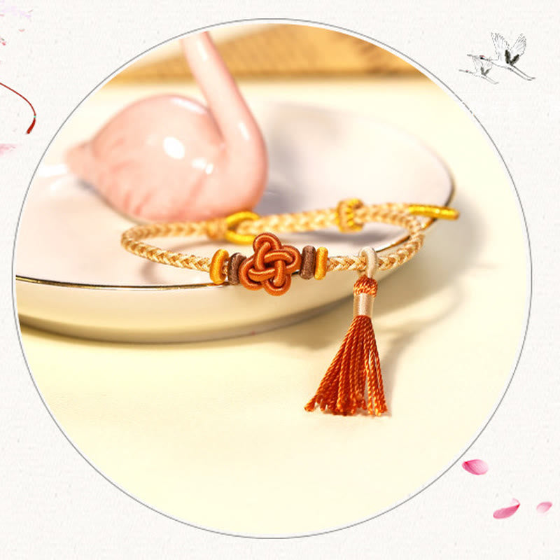 Bracelet de protection coloré en fil de fleur de pêcher pour l'harmonie