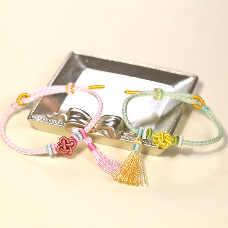 Bracelet de protection coloré en fil de fleur de pêcher pour l'harmonie