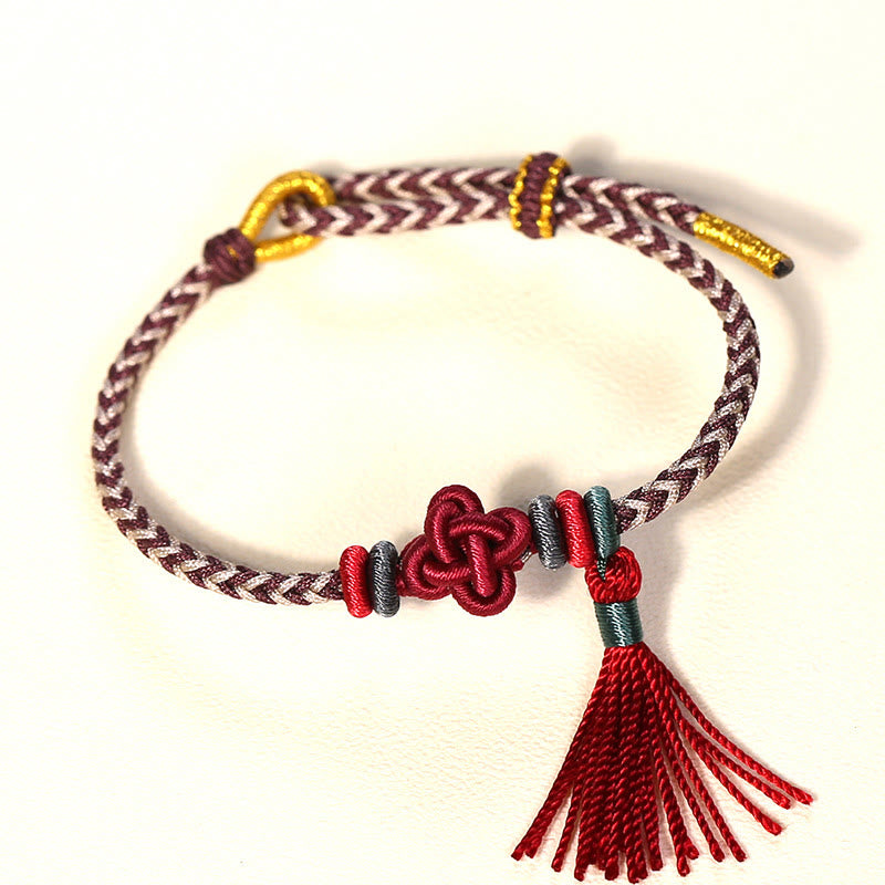 Bracelet de protection coloré en fil de fleur de pêcher pour l'harmonie
