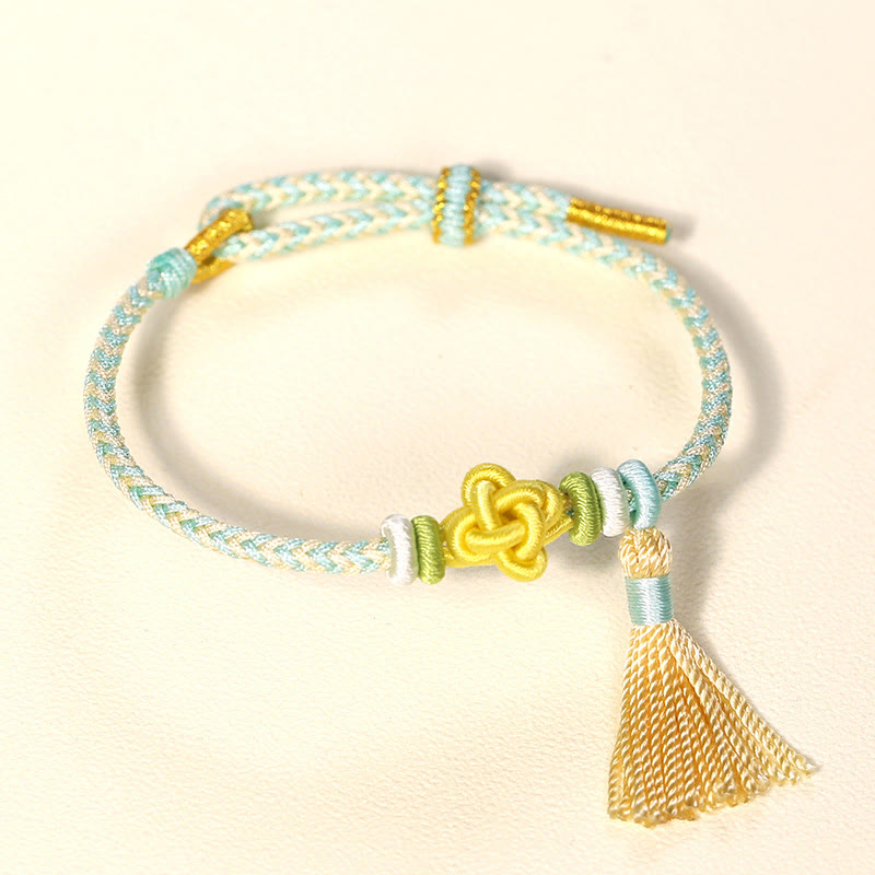 Bracelet de protection coloré en fil de fleur de pêcher pour l'harmonie