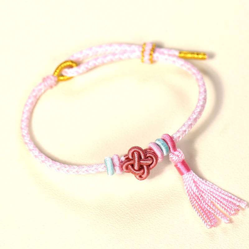Bracelet de protection coloré en fil de fleur de pêcher pour l'harmonie