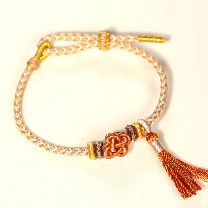Bracelet de protection coloré en fil de fleur de pêcher pour l'harmonie