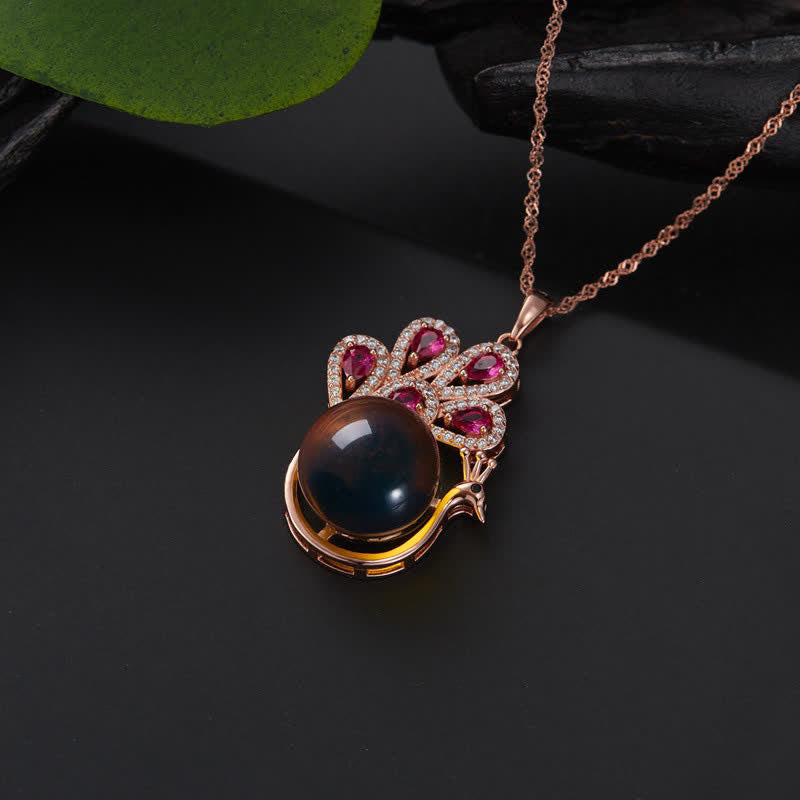 Collier et bague porte-bonheur en ambre paon | Sons de guérison