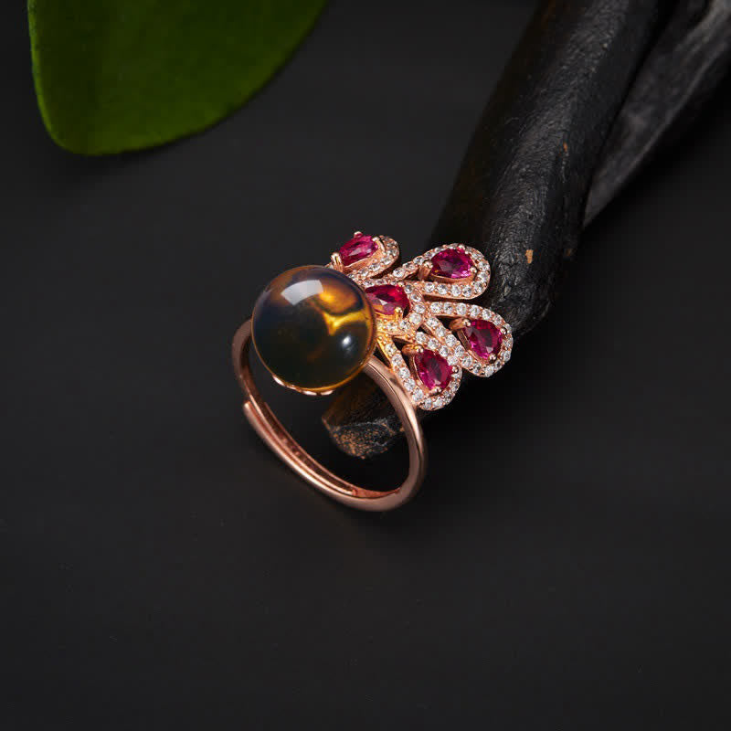 Collier et bague porte-bonheur en ambre paon | Sons de guérison